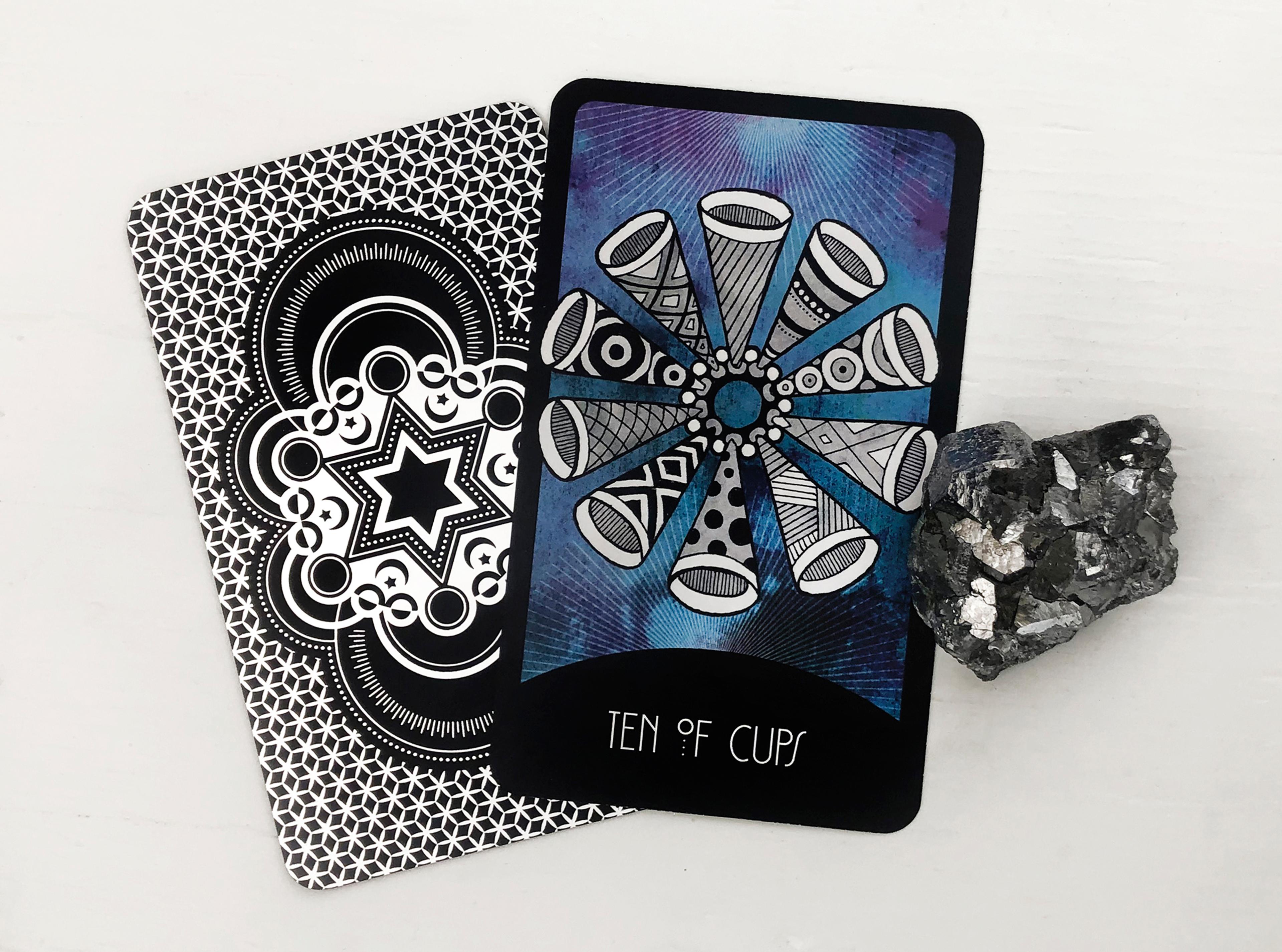 The Ten of Cups Tarot Card