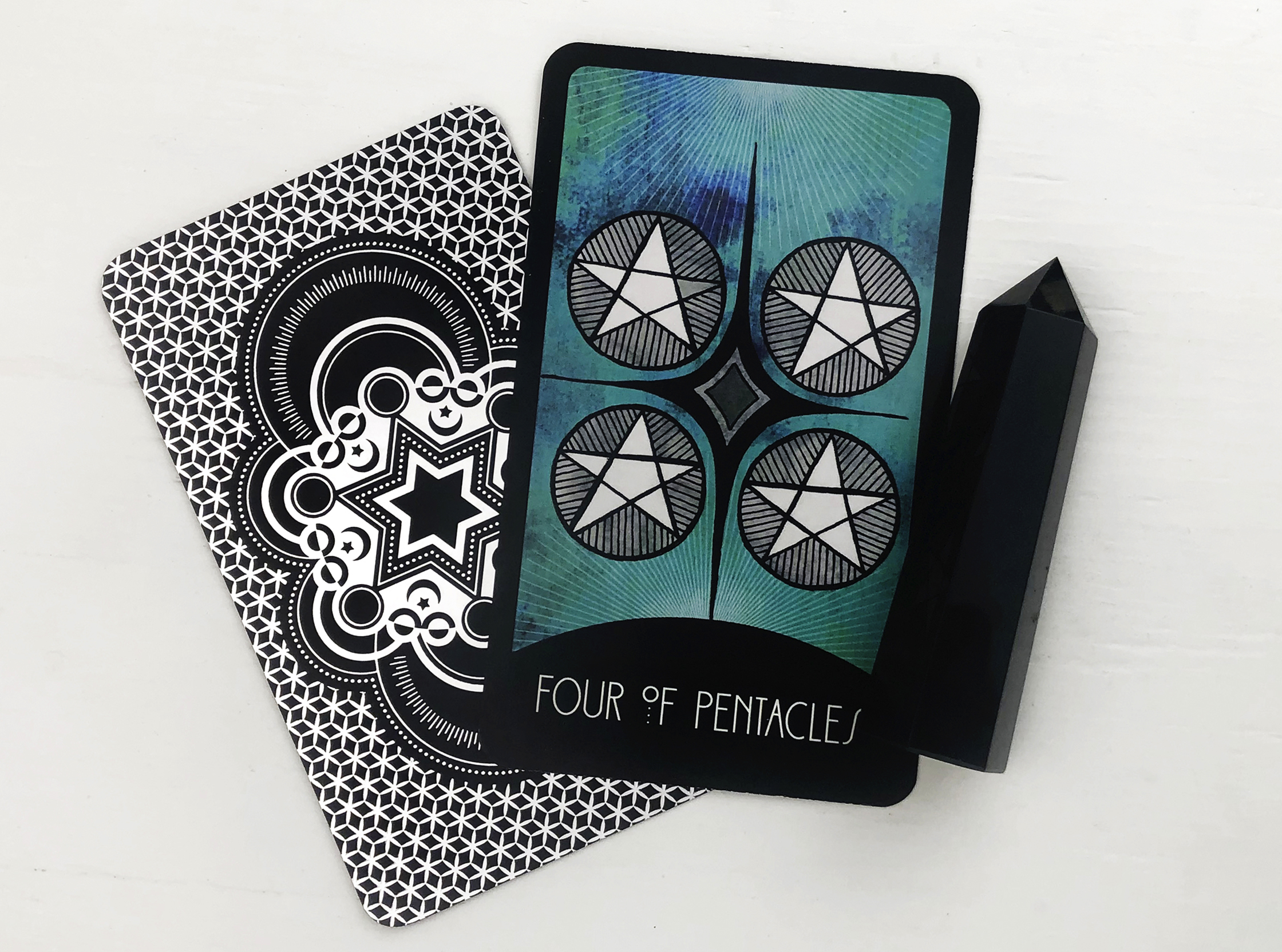 Four of Pentacles Tarot Card