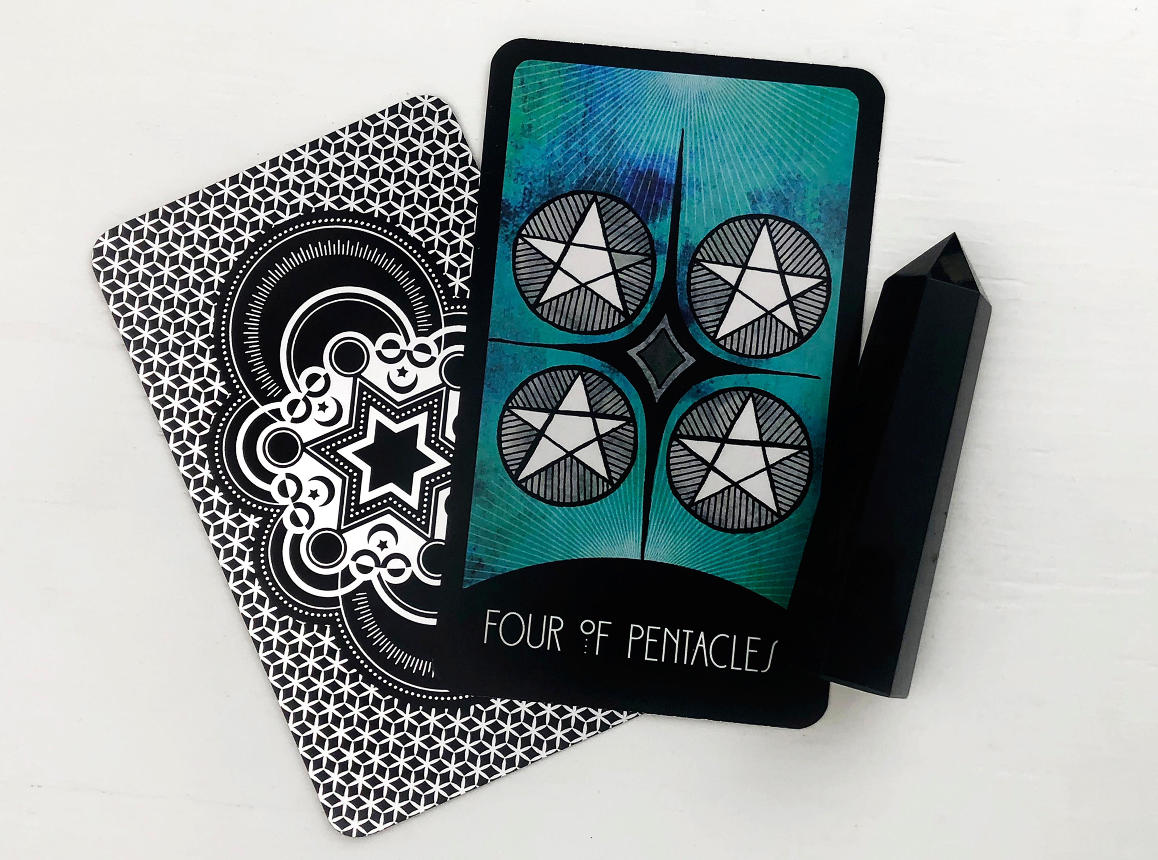 Four of Pentacles Tarot Card