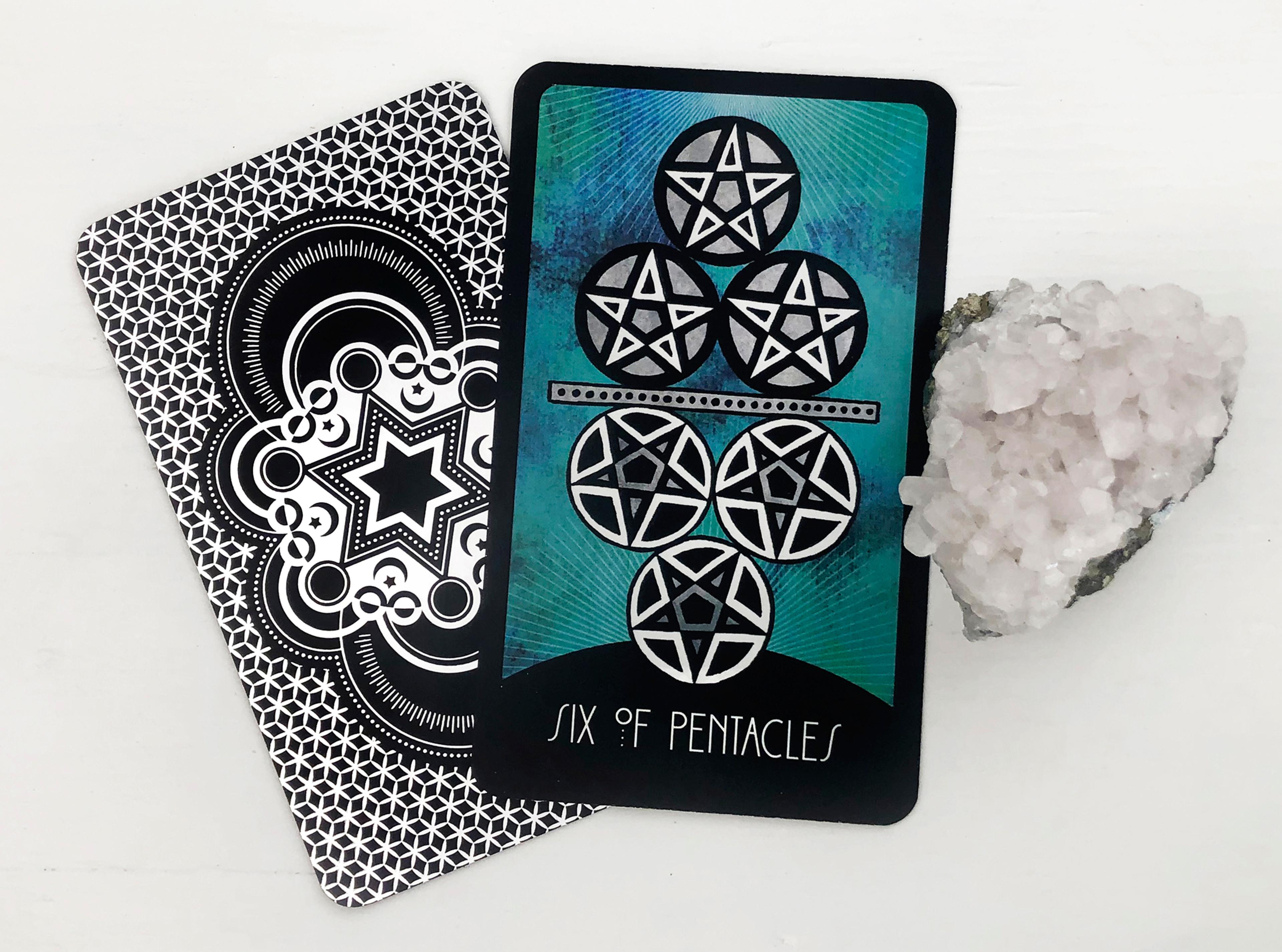 Six of Pentacles Tarot Card