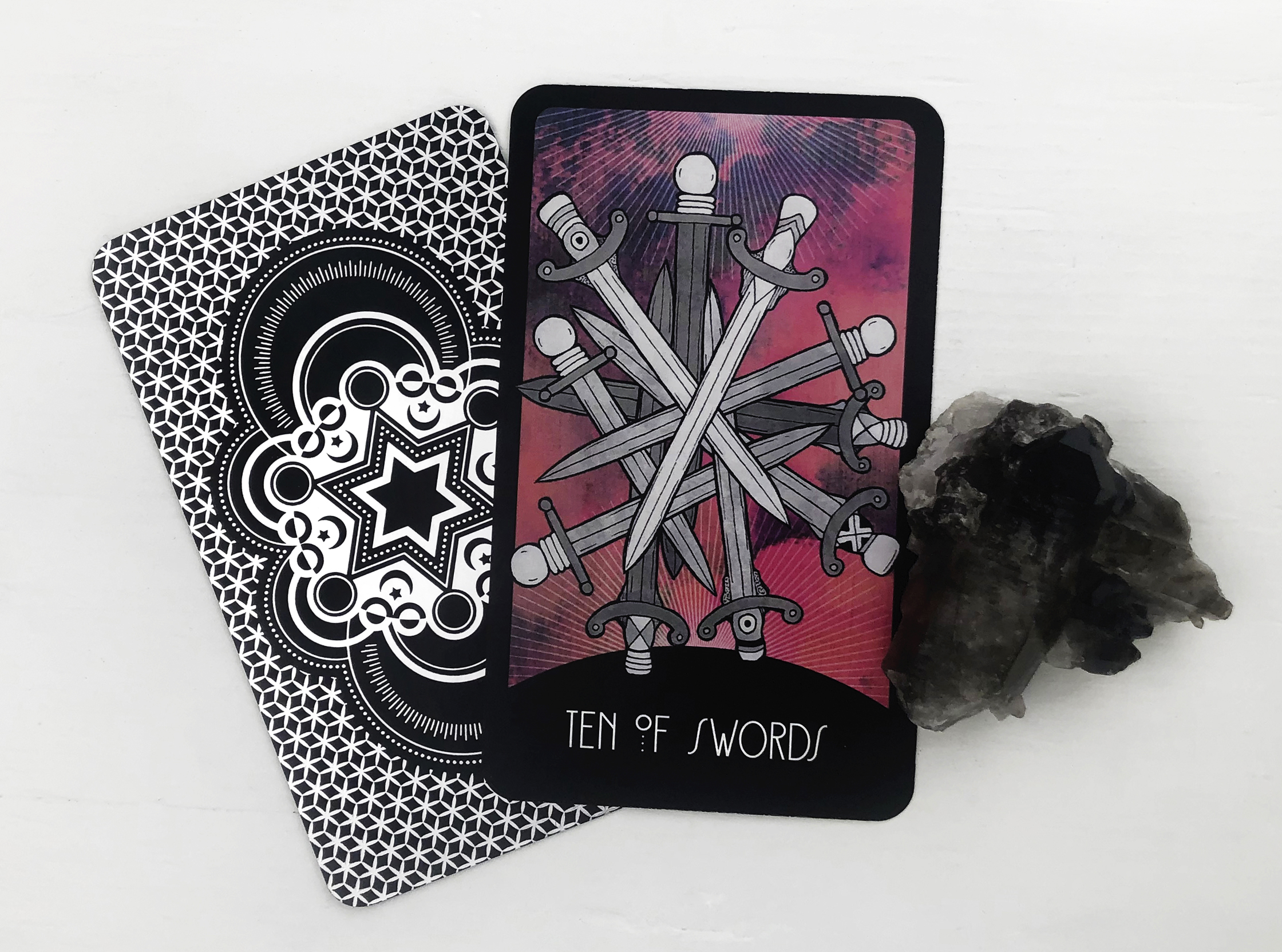 Ten of Swords Reversed Tarot Card