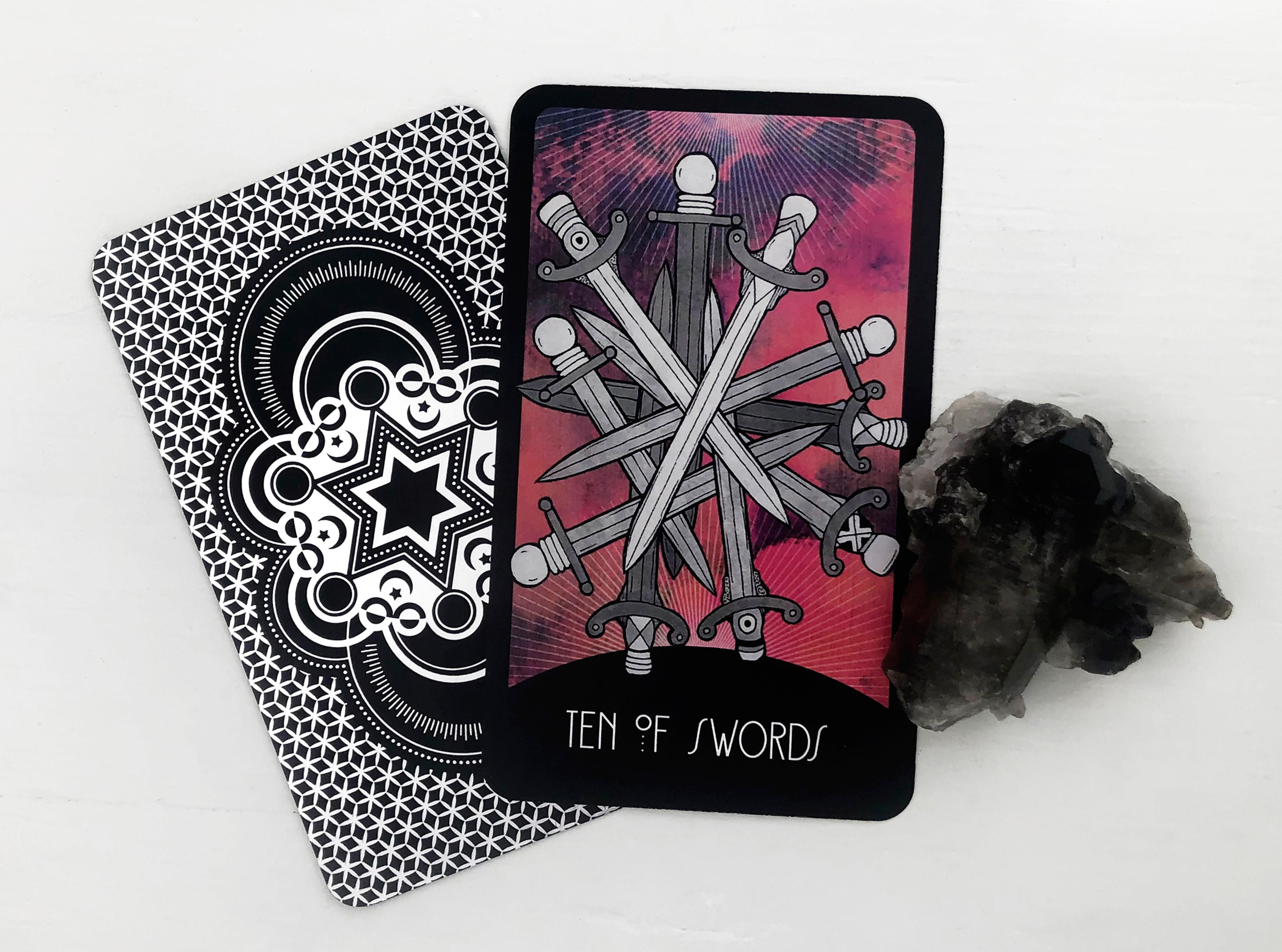 Ten of Swords Reversed Tarot Card