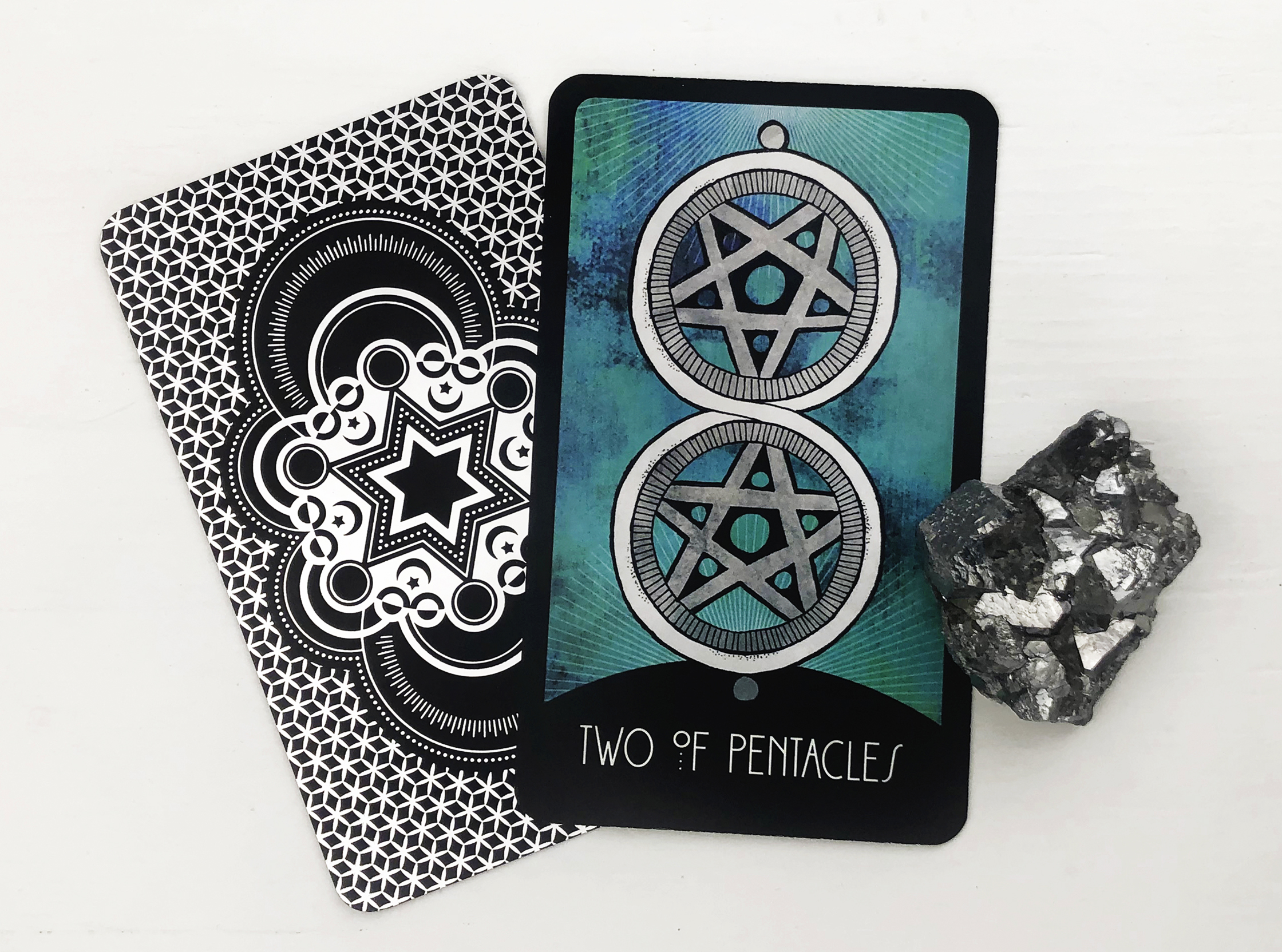 The Two of Pentacles Tarot Card