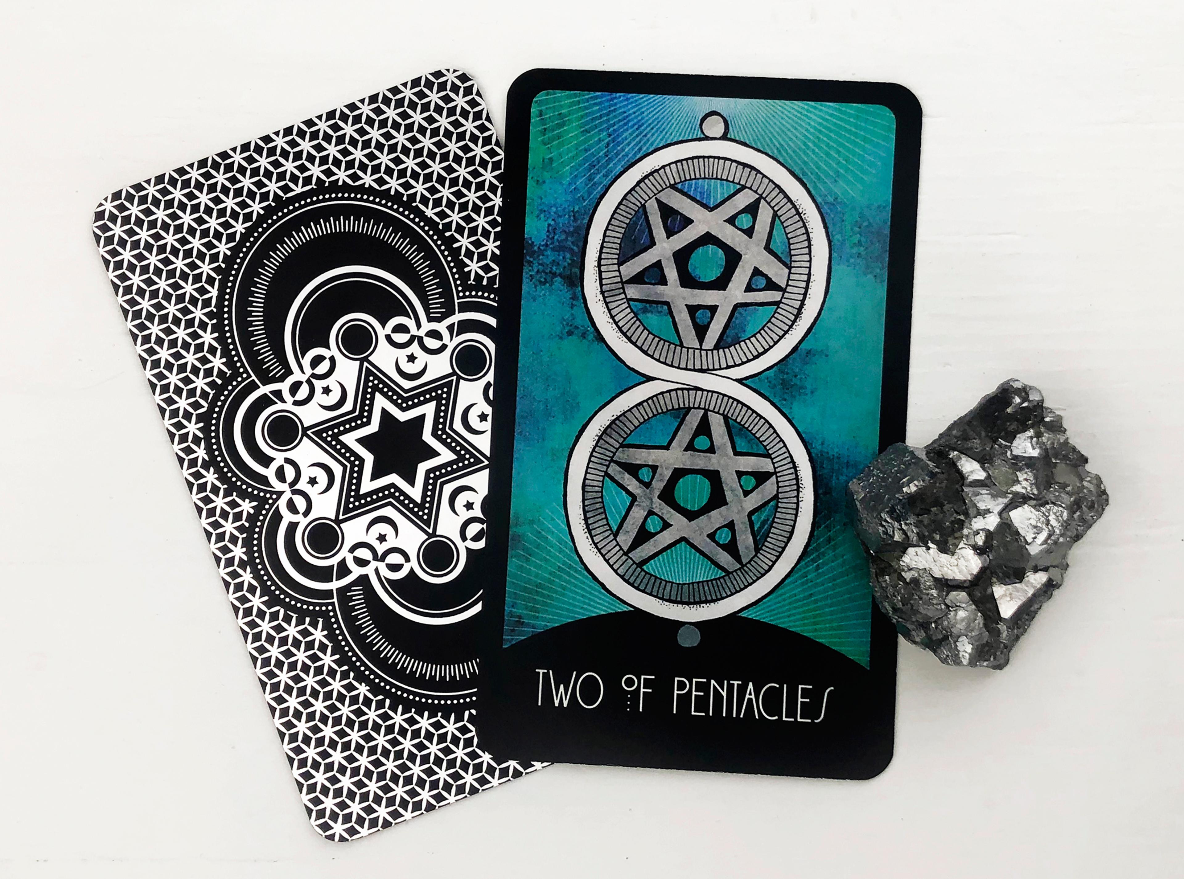 The Two of Pentacles Tarot Card
