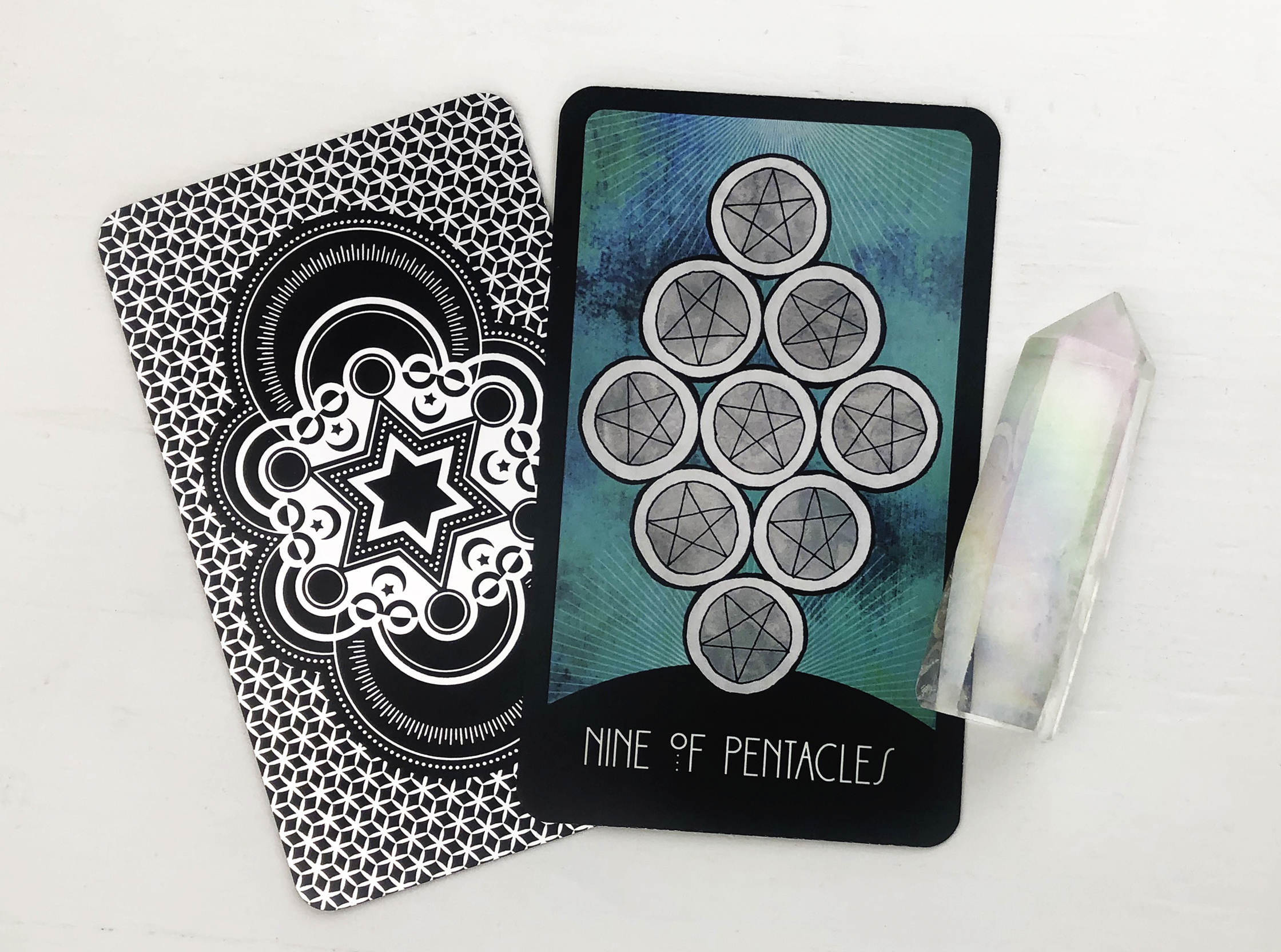 The Nine of Pentacles Tarot Card