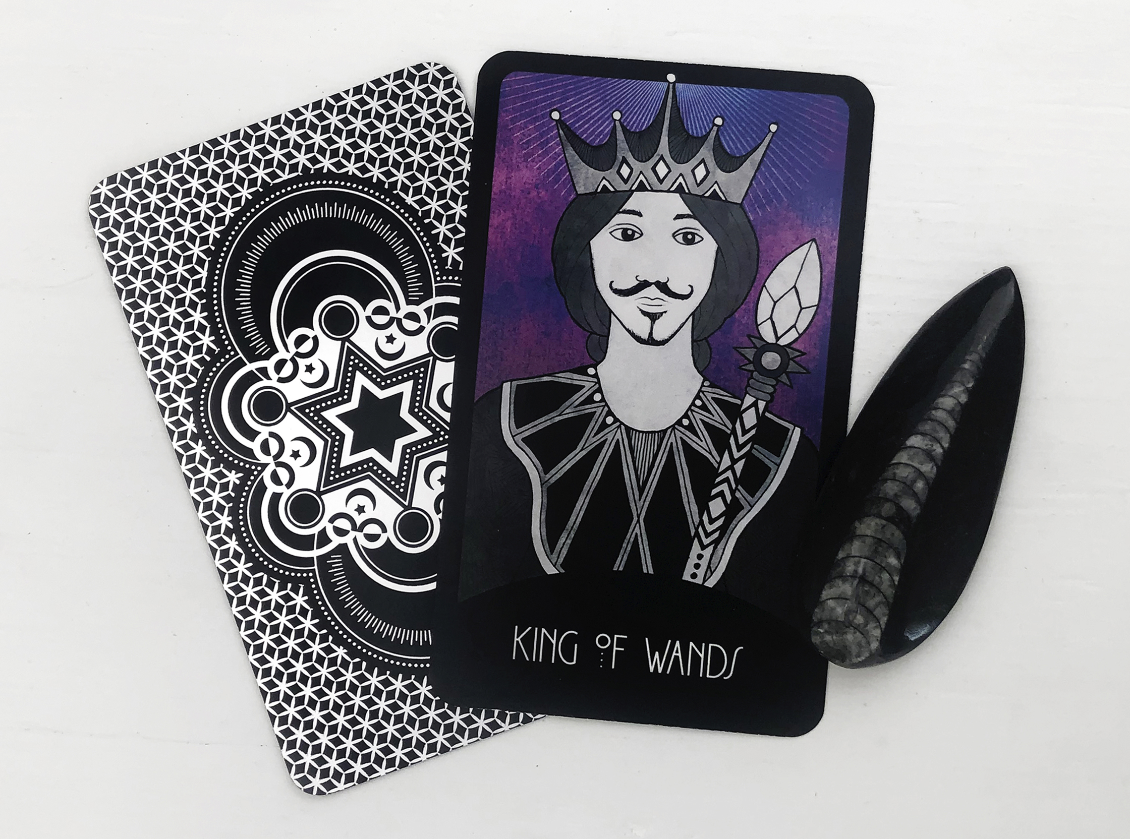 King of Wands Reversed Tarot Card